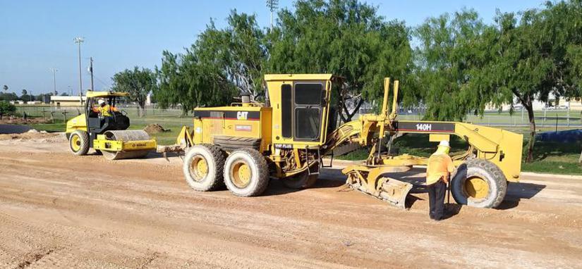Diamond Eight CAT motor grader and roller — road base construction